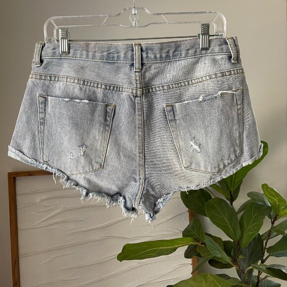 Women's POOKIE Loves SEBASTIAN Cut Off Denim Jean Shorts Size Large Distressed - Picture 3 of 3